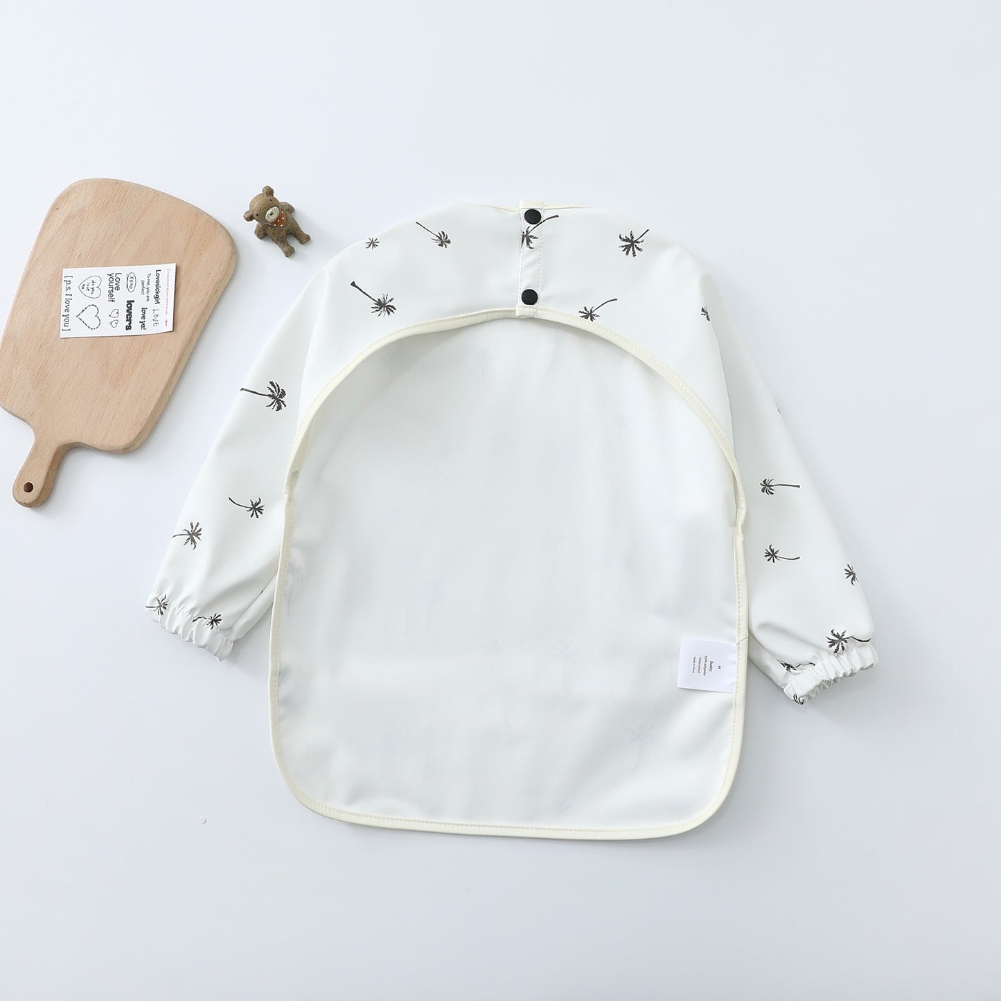 Waterproof Sleeved Cape Bib  - The Palm Tree